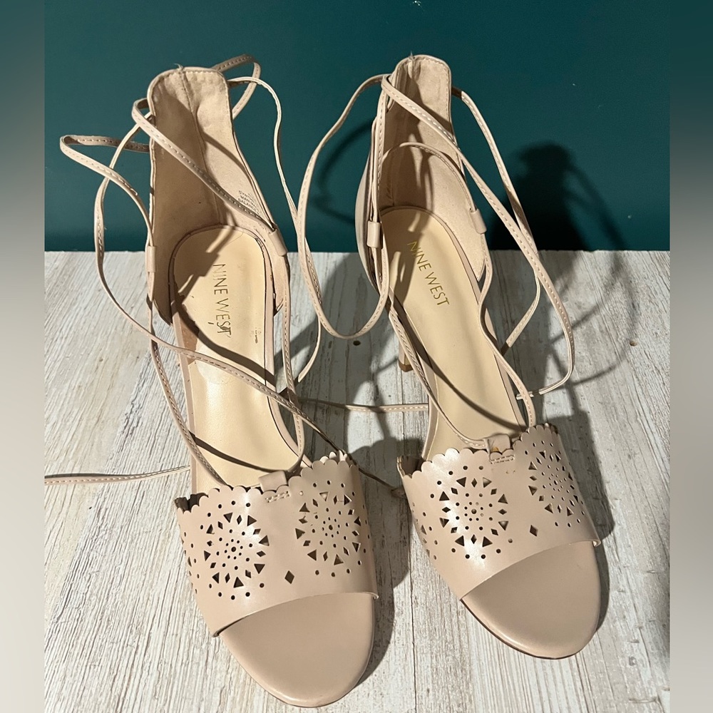 Nine West cream colored ankle strap heels. Size 9.5
